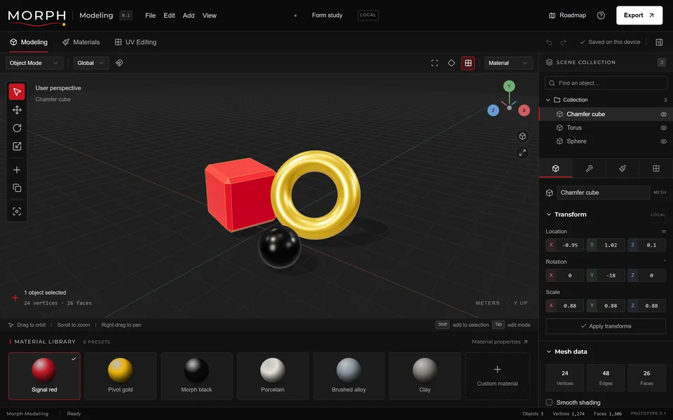 Morph Modeling viewport with a red chamfered cube, a gold torus and a black sphere, and the material library below.